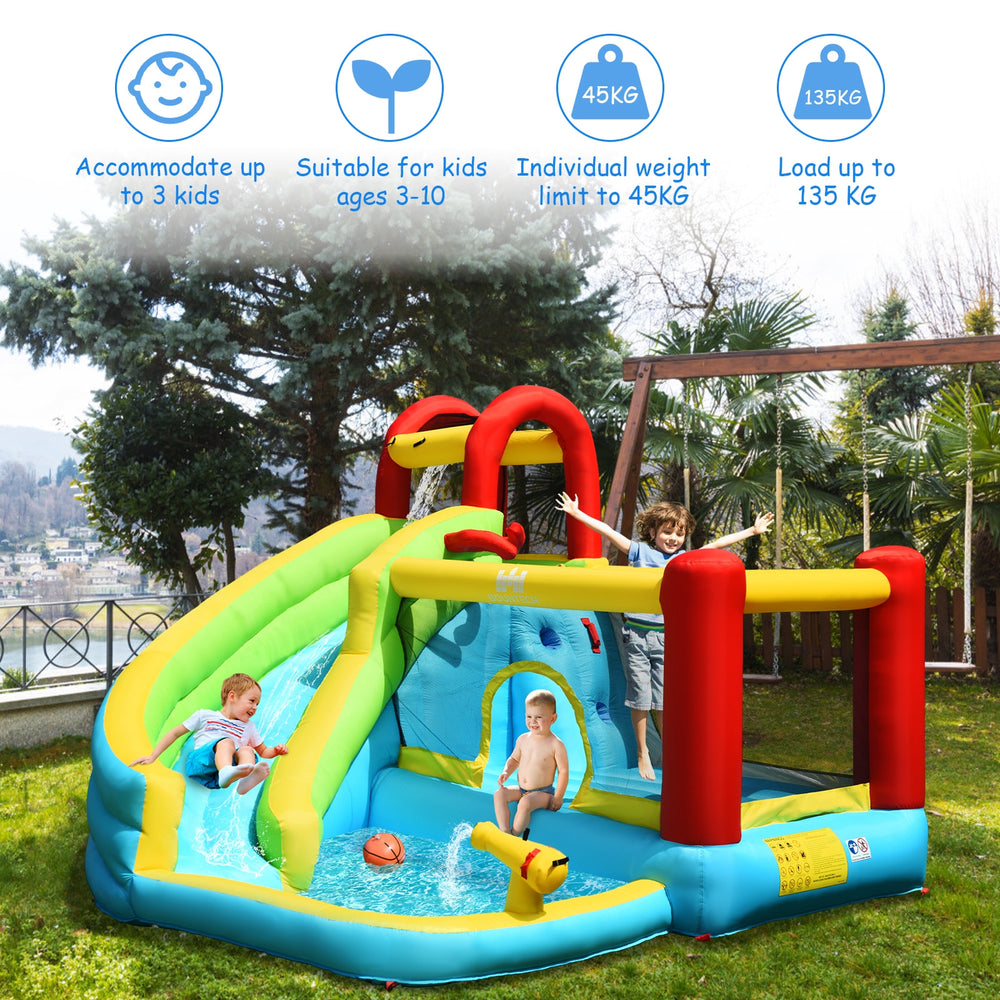 Brightly colored 6-in-1 inflatable bounce house with water slide, climbing wall, and basketball hoop for outdoor fun.
