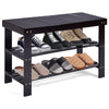 Three-tier black bamboo shoe shelf with shoes displayed, ideal for storage and as a bench for living spaces.