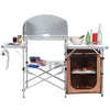 Foldable outdoor BBQ grilling table with windscreen, aluminum frame, and zippered storage bag for camping convenience.