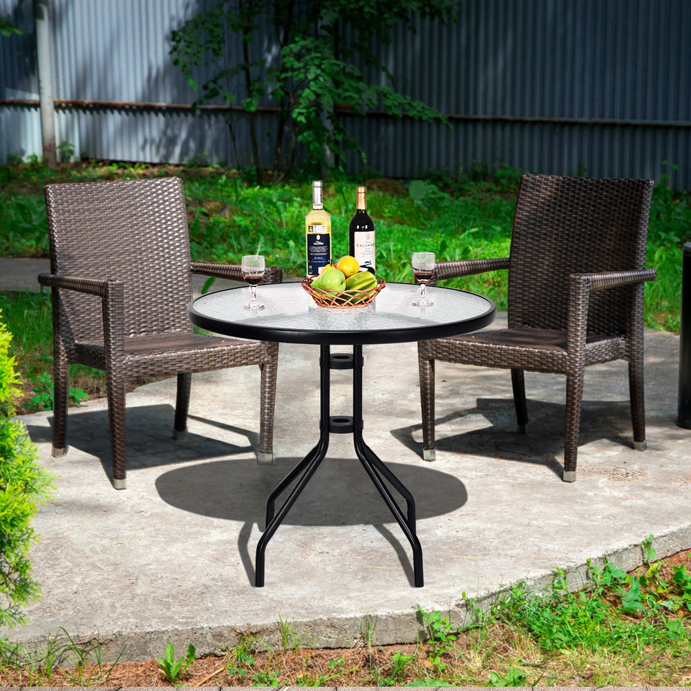 Round 32-inch outdoor patio table with tempered glass top and umbrella hole, perfect for backyard gatherings.