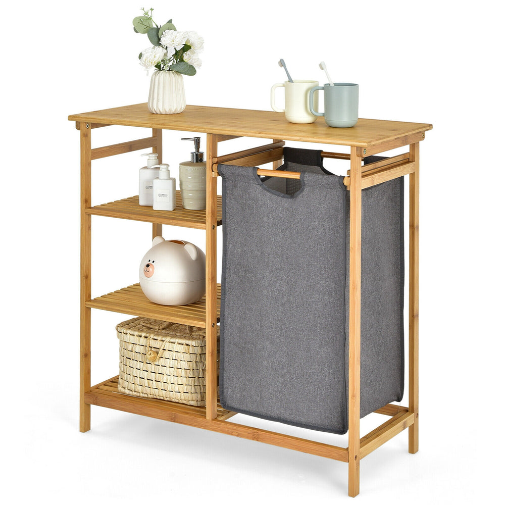 Bamboo laundry hamper stand with removable bag and 3-tier open shelves for organized storage in laundry or bathroom.