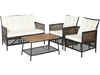 4-piece patio rattan furniture set with white cushions, including loveseat, two armchairs, and acacia wood coffee table.