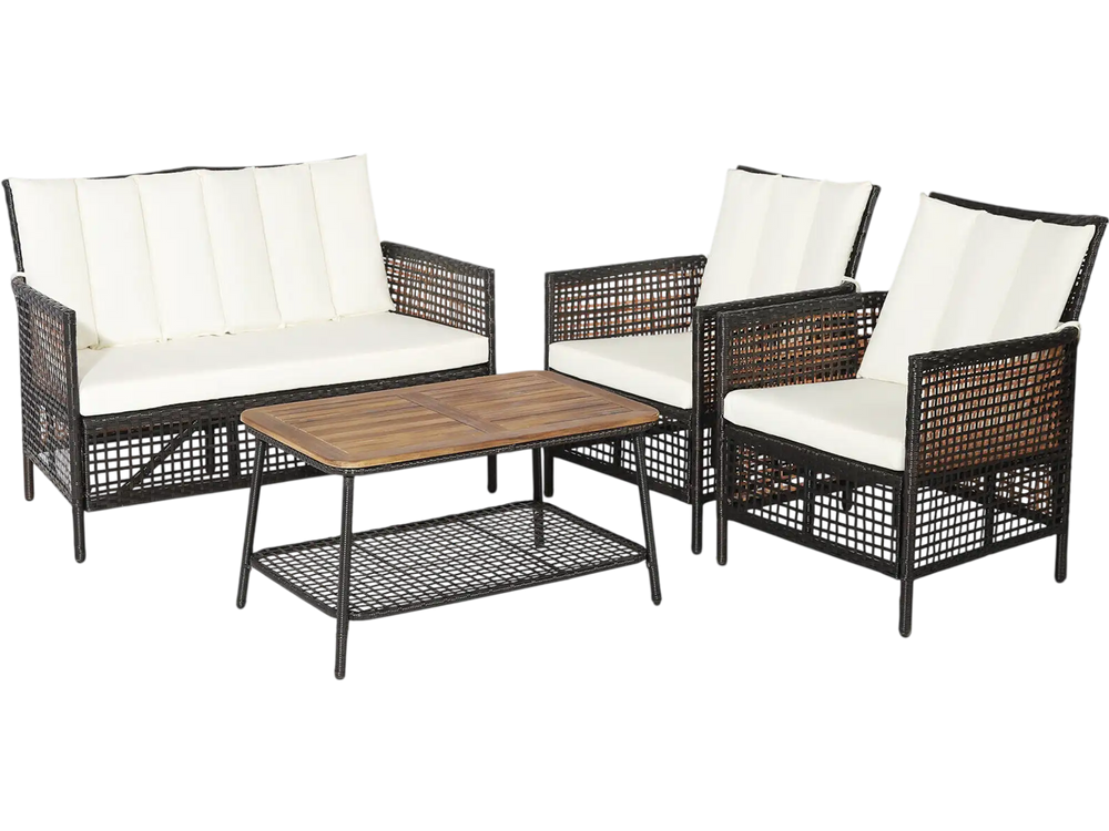 4-piece patio rattan furniture set with white cushions, including loveseat, two armchairs, and acacia wood coffee table.