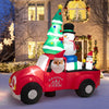 Inflatable Santa Claus driving a car with snowman and penguin, 8 feet wide, bright LED lights for outdoor Christmas.