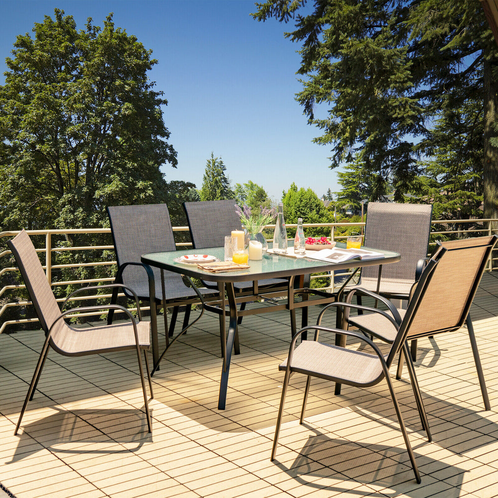 Rectangular 55" patio dining table with tempered glass top and umbrella hole, perfect for outdoor gatherings.