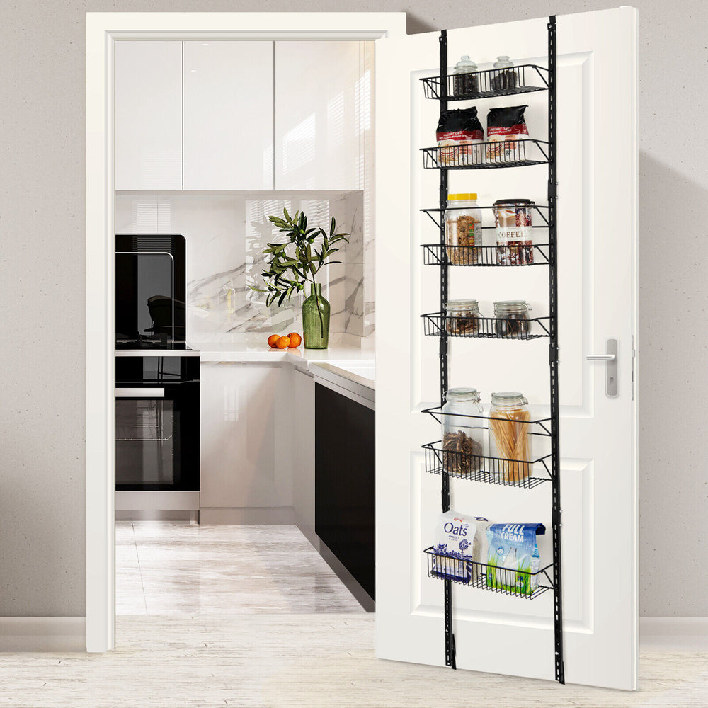 Over the door pantry organizer rack with 6 adjustable baskets for kitchen condiments and snacks, mounted on a door.