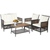 4-piece patio rattan furniture set with white cushions, featuring a loveseat, two armchairs, and a 2-tier coffee table.