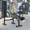 Adjustable weight bench with barbell rack, featuring foam padding and leg developer for versatile home gym workouts.