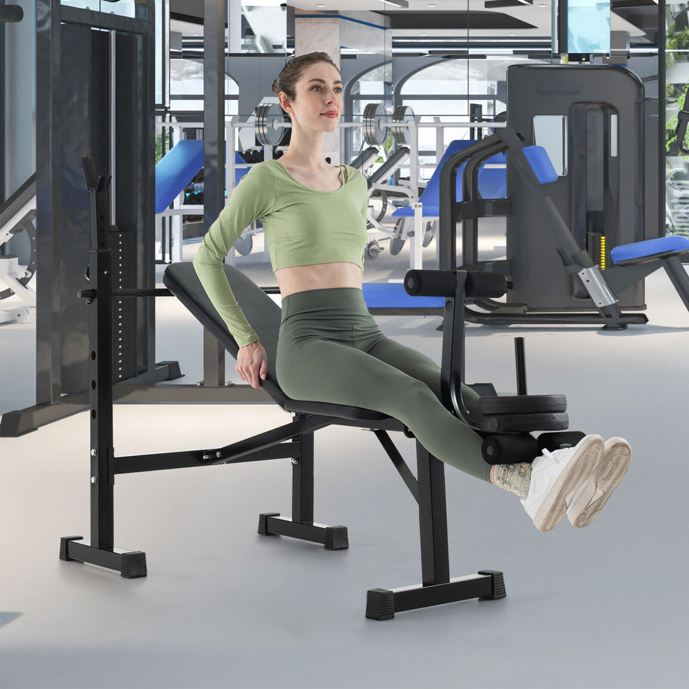 Adjustable weight bench with barbell rack, featuring foam padding and leg developer for versatile home gym workouts.