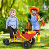 Kids ride-on sand dumper in red with all-terrain wheels, perfect for outdoor play and digging in sand or snow.