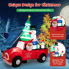 Inflatable Santa Claus driving a car with snowman and penguin, 8 feet wide, bright LED lights for Christmas decoration.