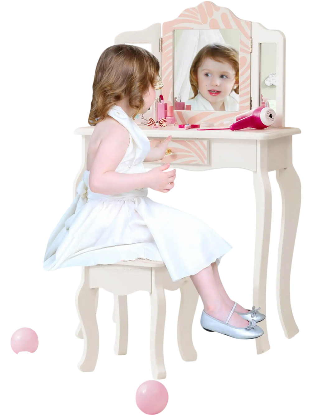 Kids vanity table set in pink with tri-folding mirror and stool, perfect for makeup or study in a child's room.