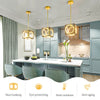 Modern LED pendant light in gold with adjustable suspender, ideal for kitchen or living room, featuring warm white.