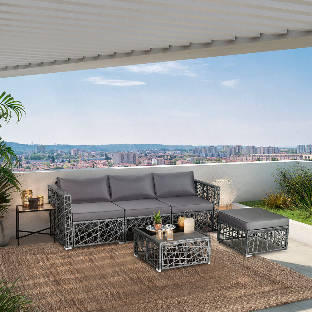 5-piece patio PE rattan wicker sofa set in gray with cushions, coffee table, and ottoman for outdoor relaxation.