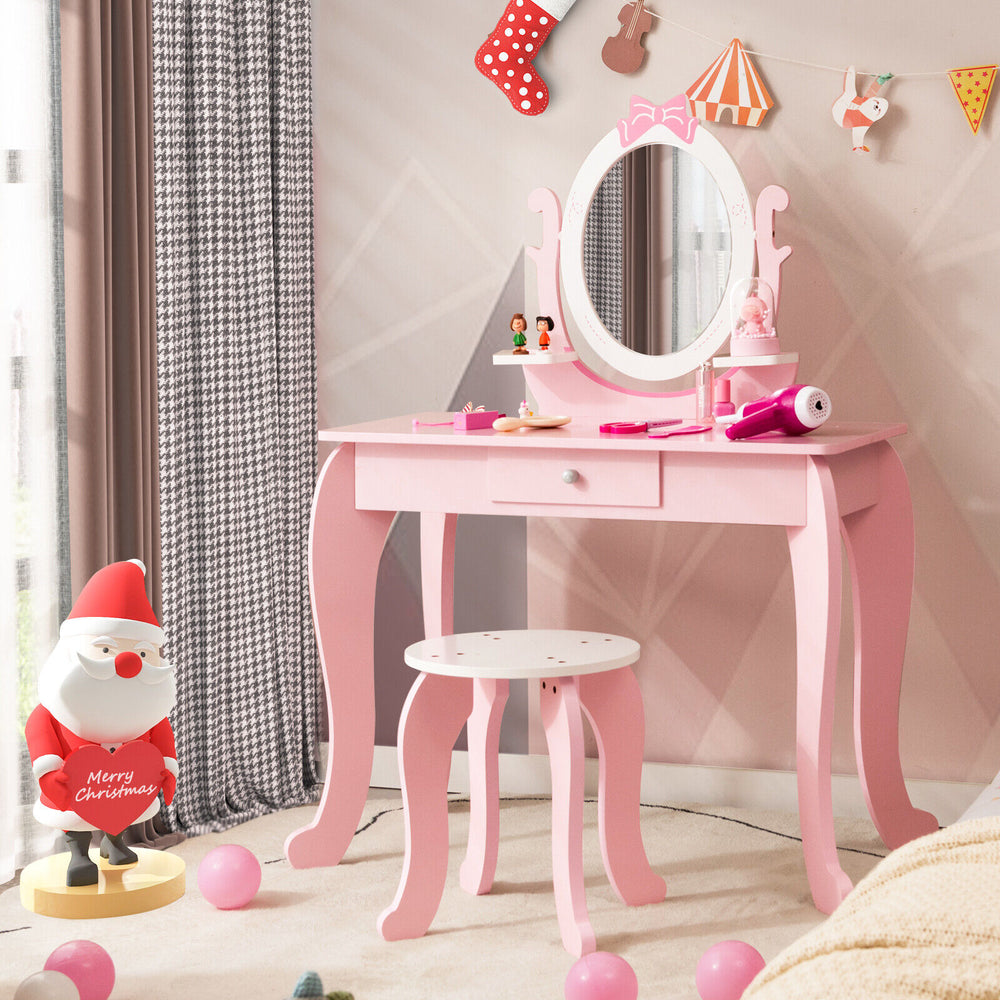 Pink kid vanity table and stool set with oval rotatable mirror, featuring a spacious tabletop and practical drawer for.