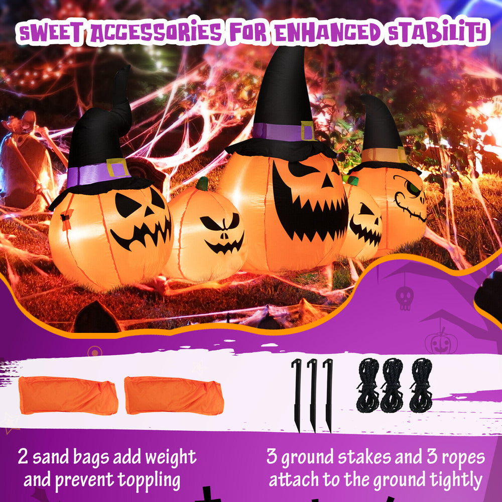 Stability accessories for inflatable pumpkin family, including sandbags, stakes, and ropes for secure Halloween.