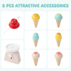 Colorful wooden ice cream accessories including cones and a bell for the Kids Wooden Ice Cream Cart with storage.