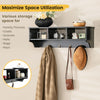 Black wall-mounted cubby organizer with four hooks, ideal for entryway storage and displaying various items.