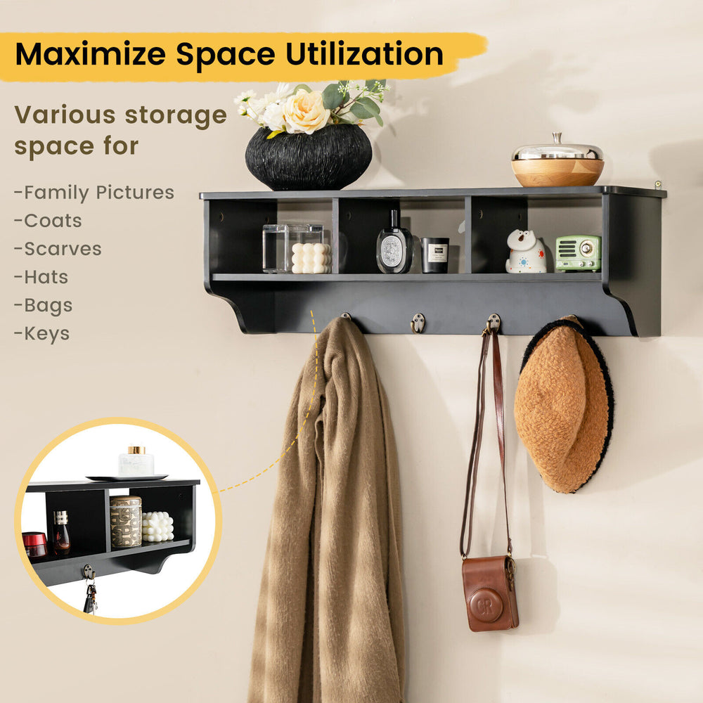 Black wall-mounted cubby organizer with four hooks, ideal for entryway storage and displaying various items.