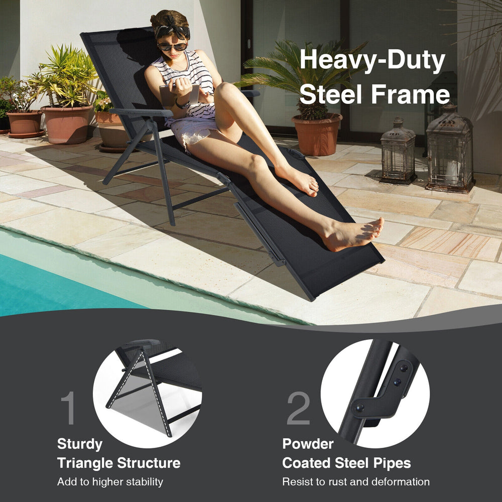 Foldable chaise lounge chair with adjustable footrest, black breathable fabric, and sturdy steel frame for outdoor.