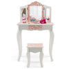Kids vanity table set in pink and white with tri-folding mirror and stool, perfect for makeup or study space.