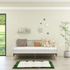 White wooden full-size daybed frame with guardrails, styled as a sofa, featuring plush cushions for comfort and decor.