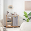 Bamboo laundry hamper stand with a wide tabletop and three open shelves, ideal for organizing essentials in any room.