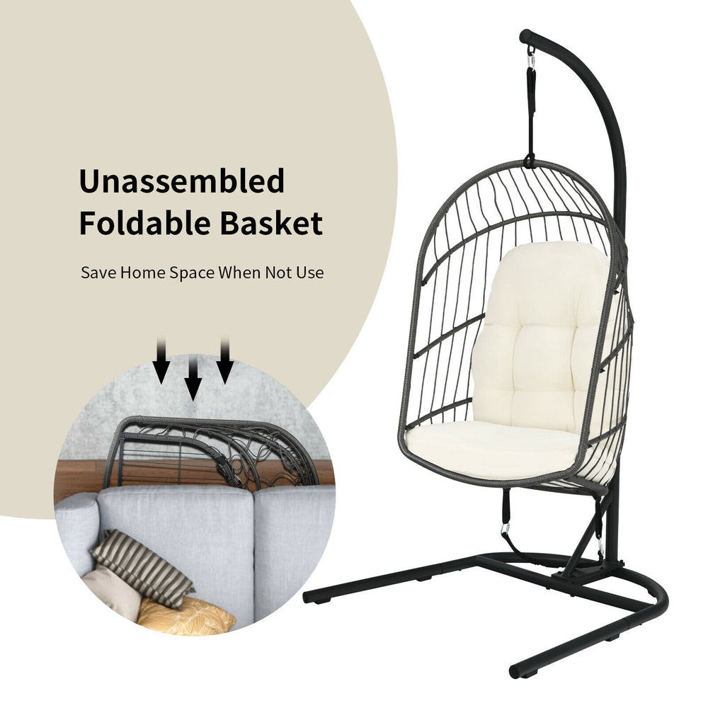 Hanging wicker egg chair with beige cushions, featuring a sturdy steel frame and foldable design for space-saving.