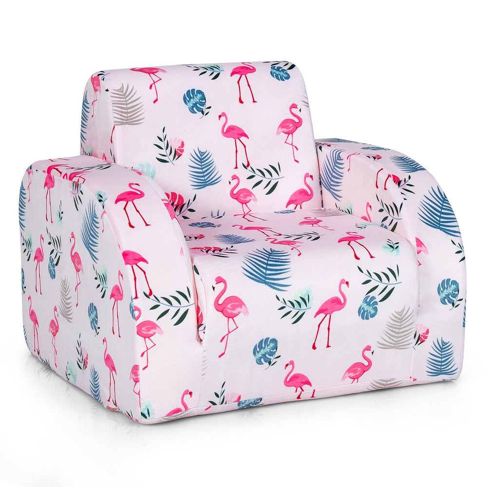 Convertible kids sofa bed in pink with flamingo patterns, made of soft velvet, perfect for playroom or living room use.