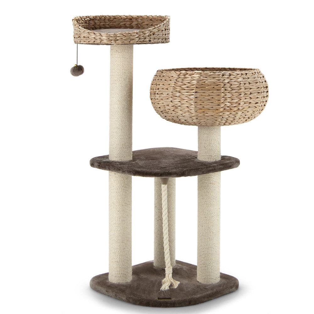 Rattan cat tree with napping perch, sisal posts, and soft cushions for comfortable play and relaxation.