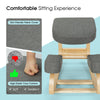 Ergonomic gray kneeling chair with elastic cushion and solid wood base, designed for comfortable and upright posture.