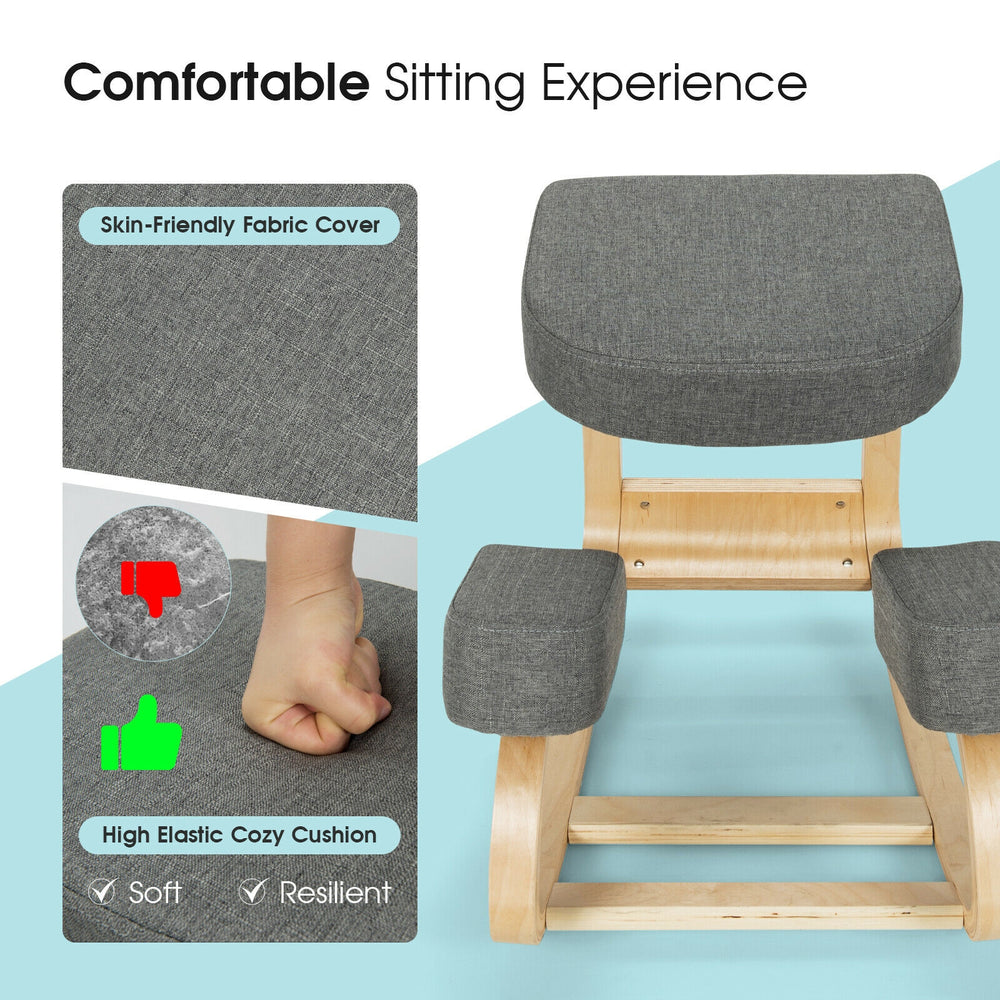Ergonomic gray kneeling chair with elastic cushion and solid wood base, designed for comfortable and upright posture.