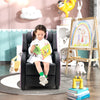 Kids recliner chair in pink with adjustable backrest and footrest, featuring side pockets for storage, perfect for.