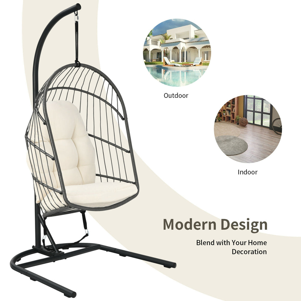 Hanging wicker egg chair with stand in beige, made of weather-resistant PE rattan and anti-rust steel frame for indoor.