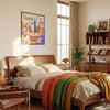 The "Earthly Homeland" 100% mulberry silk scarf features vibrant colors and hand-rolled hems, perfect for home decor.