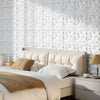 3D white PVC wall panels with diamond accent, perfect for DIY interior decoration in bedrooms or living rooms.