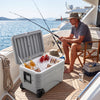 Gray 103 Quart outdoor portable wheeled ice cooler with foldable handles, ideal for keeping drinks cold on a boat.