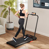 Woman jogging on a folding treadmill with LED display, ideal for home fitness and relaxation in a modern living space.