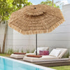 The 10FT brown tiki patio umbrella features a PE thatch canopy and 8 metal ribs for stability by the poolside.