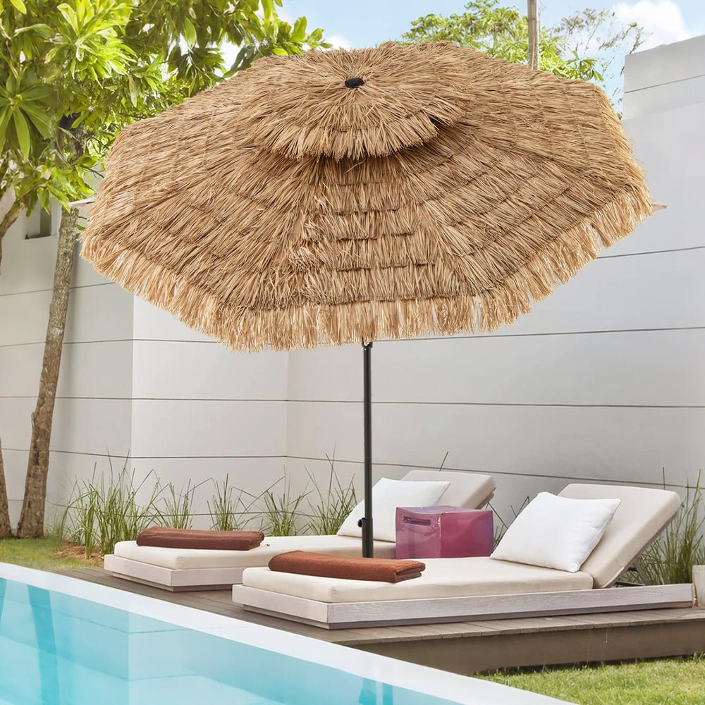 The 10FT brown tiki patio umbrella features a PE thatch canopy and 8 metal ribs for stability by the poolside.