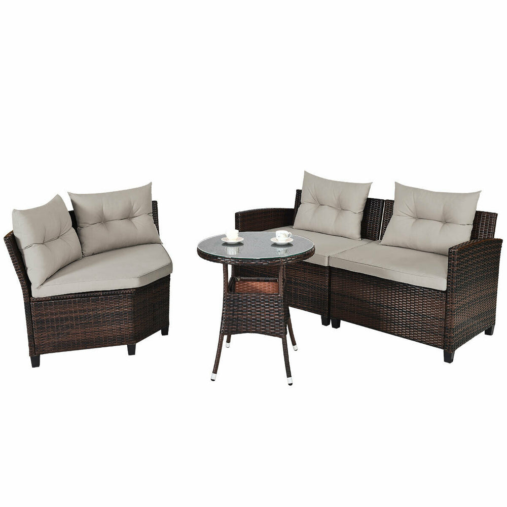 Outdoor wicker sofa set with soft cushions and a coffee table, perfect for patio relaxation and gatherings.