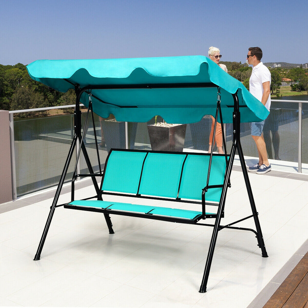 Three-person outdoor patio swing bench chair with blue canopy, durable steel frame, perfect for relaxing in gardens or.