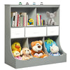 Freestanding gray cubby storage organizer with three baskets, open shelves, and plush toys for children's room.
