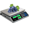 Electronic price computing scale with LCD display, stainless steel top, ideal for markets and supermarkets.