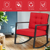 Red patio rattan rocking chair with thick cushions, sturdy metal frame, perfect for outdoor relaxation and comfort.