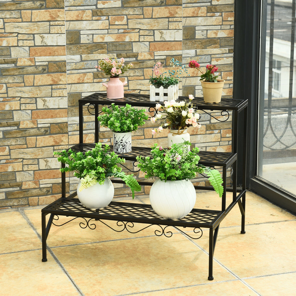 Three-tier metal decorative plant stand in black, featuring a retro design, perfect for indoor or outdoor plant display.