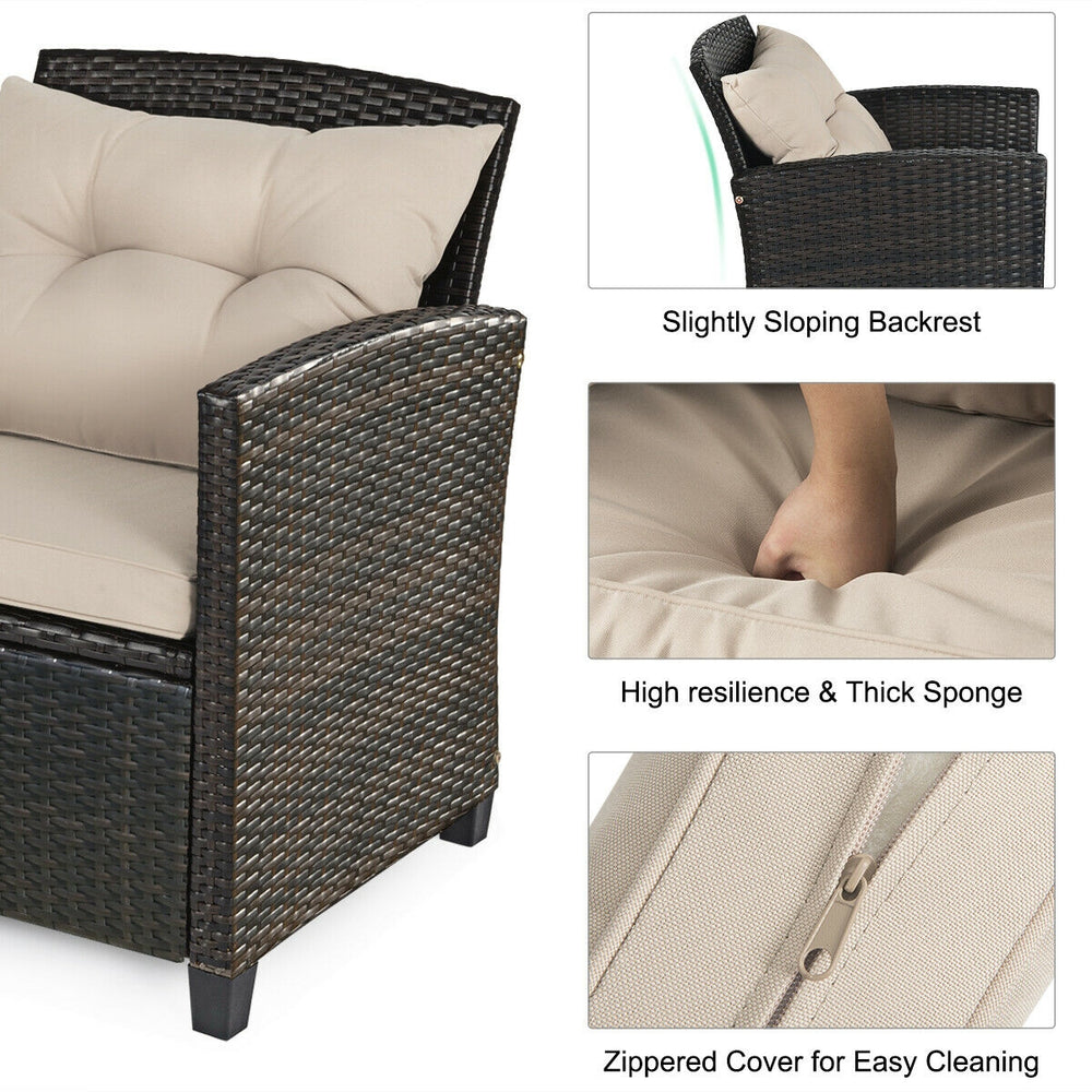 Close-up of the outdoor rattan loveseat with thick sponge cushions and zippered cover for easy cleaning.