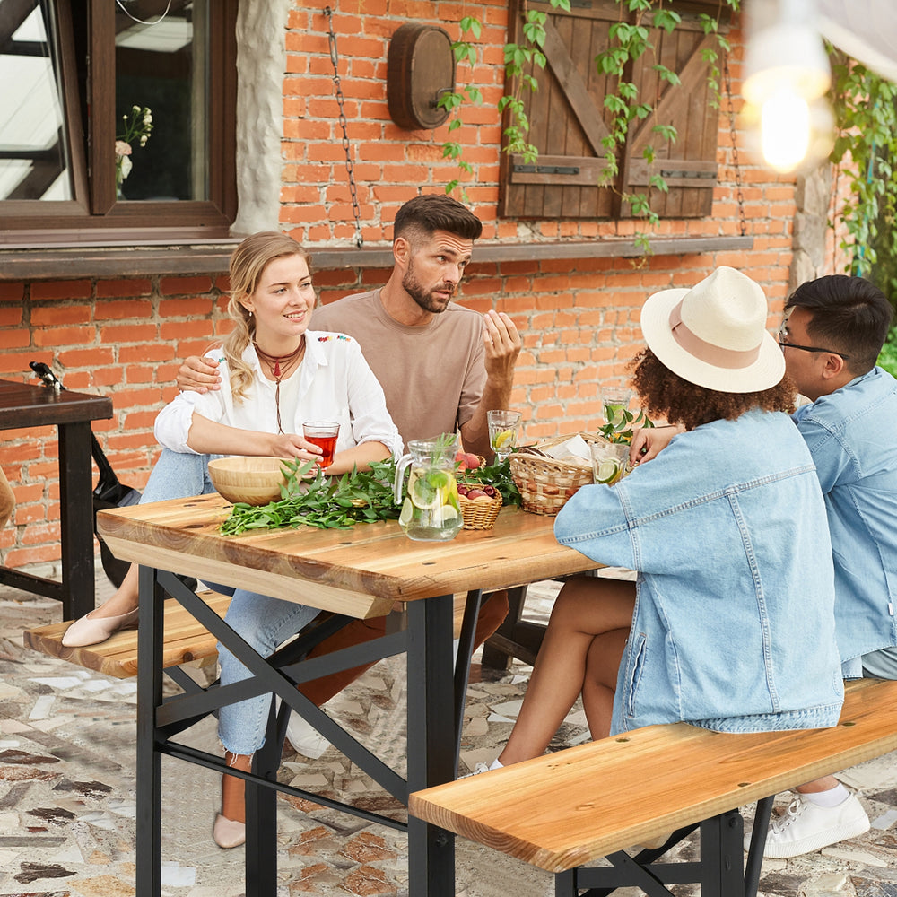 Folding wooden picnic table and benches set with rustic wood grain, perfect for indoor and outdoor gatherings.