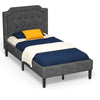 Linen twin upholstered platform bed with button-tufted headboard and under-bed storage for a tidy room.