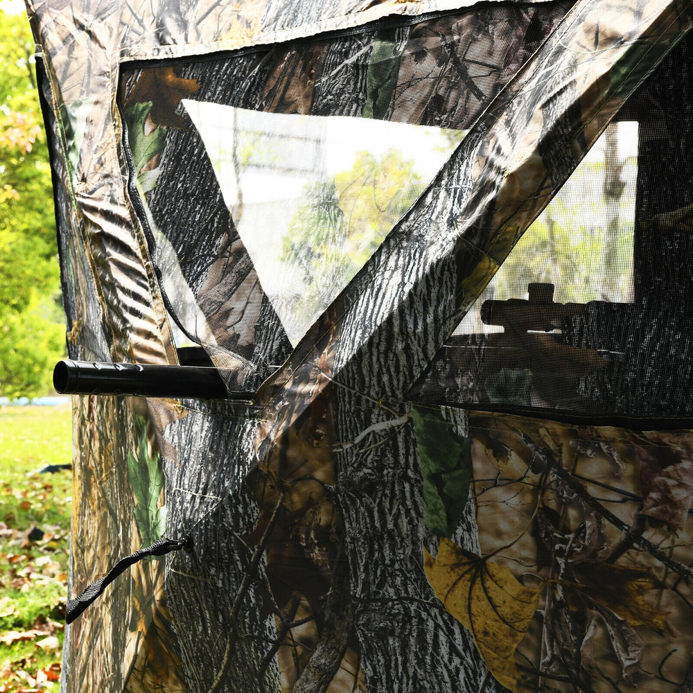 Close-up of the 3 Person Portable Pop-Up Ground Hunting Blind featuring camouflage fabric and multiple viewing windows.